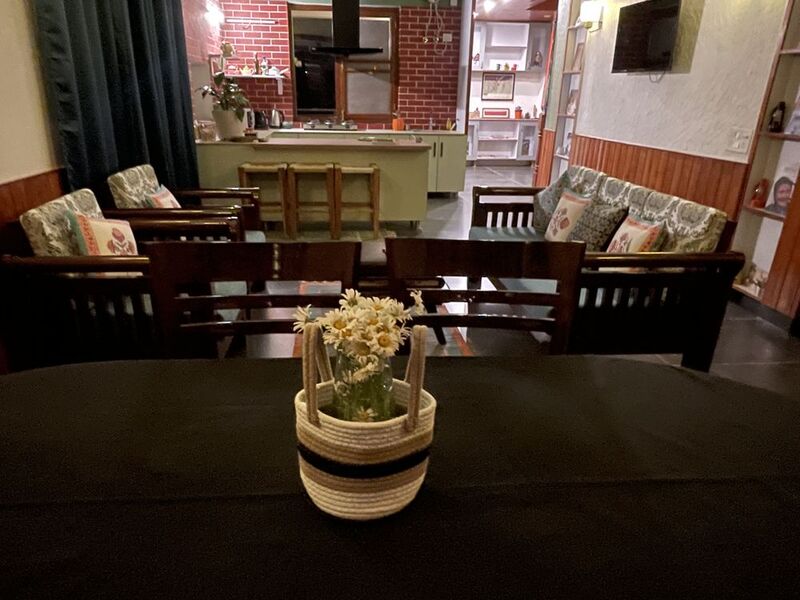 The dining area, laid for a meal